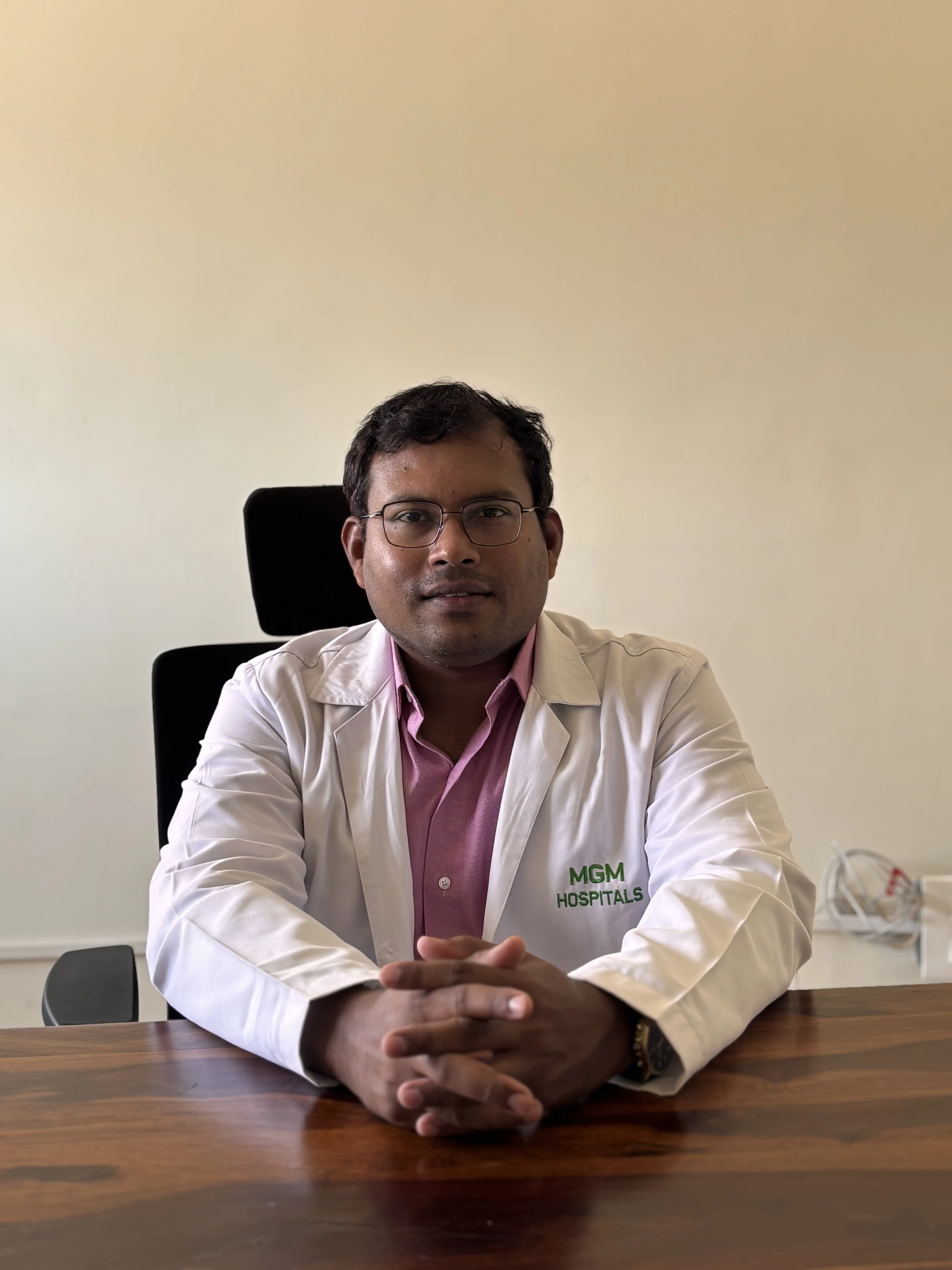 Dr. Kartheek C H